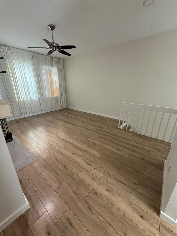 4231 Gilbert Avenue Dallas, TX 75219 - Photo 6 of 14 wooden floor in an empty room
