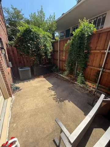 a view of backyard with seating space