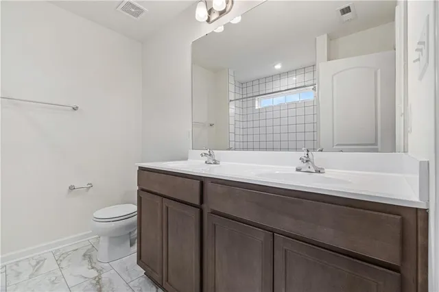 a bathroom with a shower and a bathtub