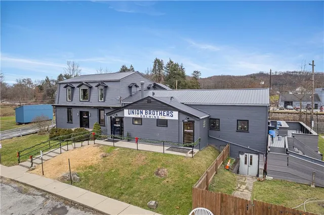 a view of house with mountain view