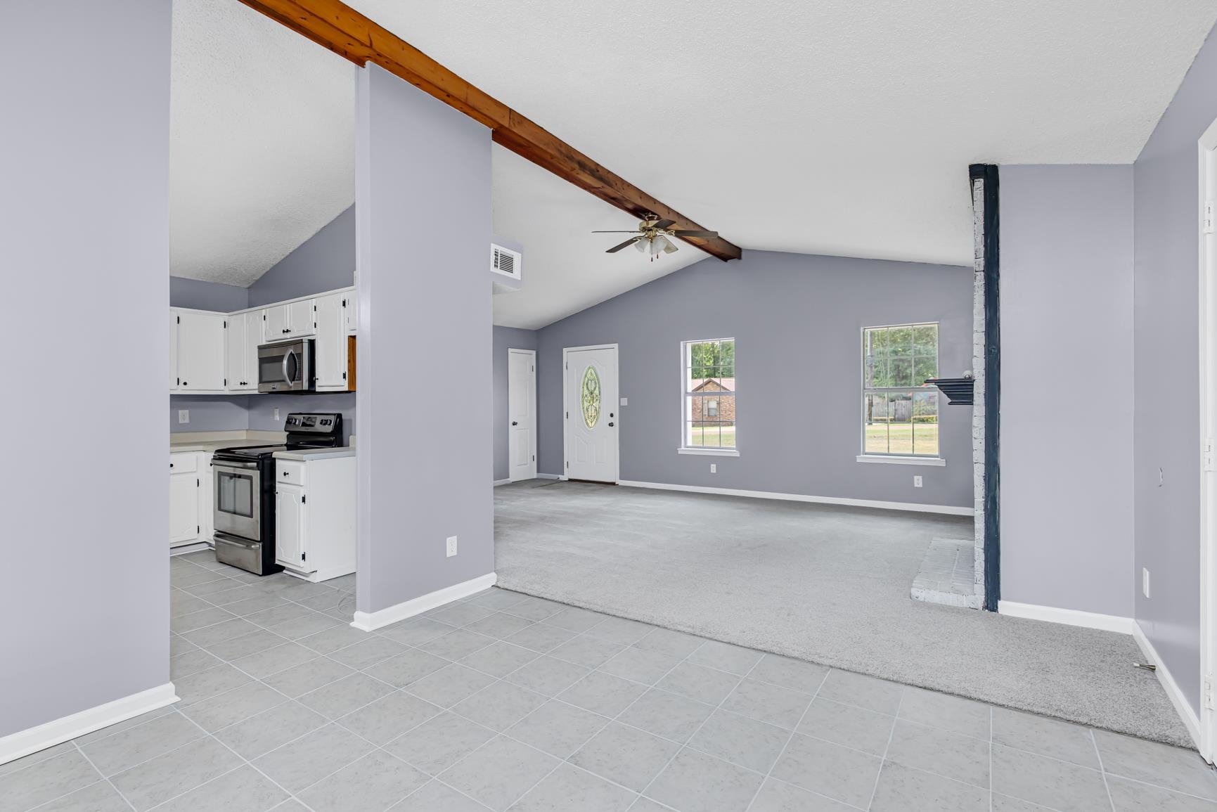 260 Chisolm Trail Road Atoka, TN 38004 - Photo 11 of 30 a view of a kitchen with furniture and window