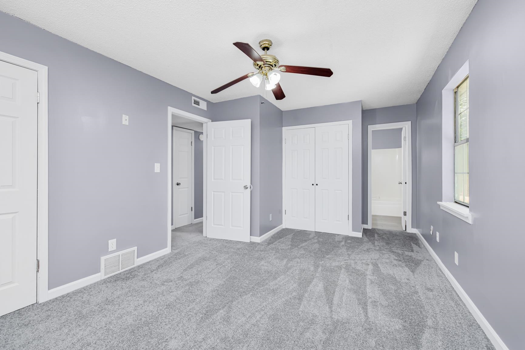260 Chisolm Trail Road Atoka, TN 38004 - Photo 15 of 30 a view of an empty room with a ceiling fan