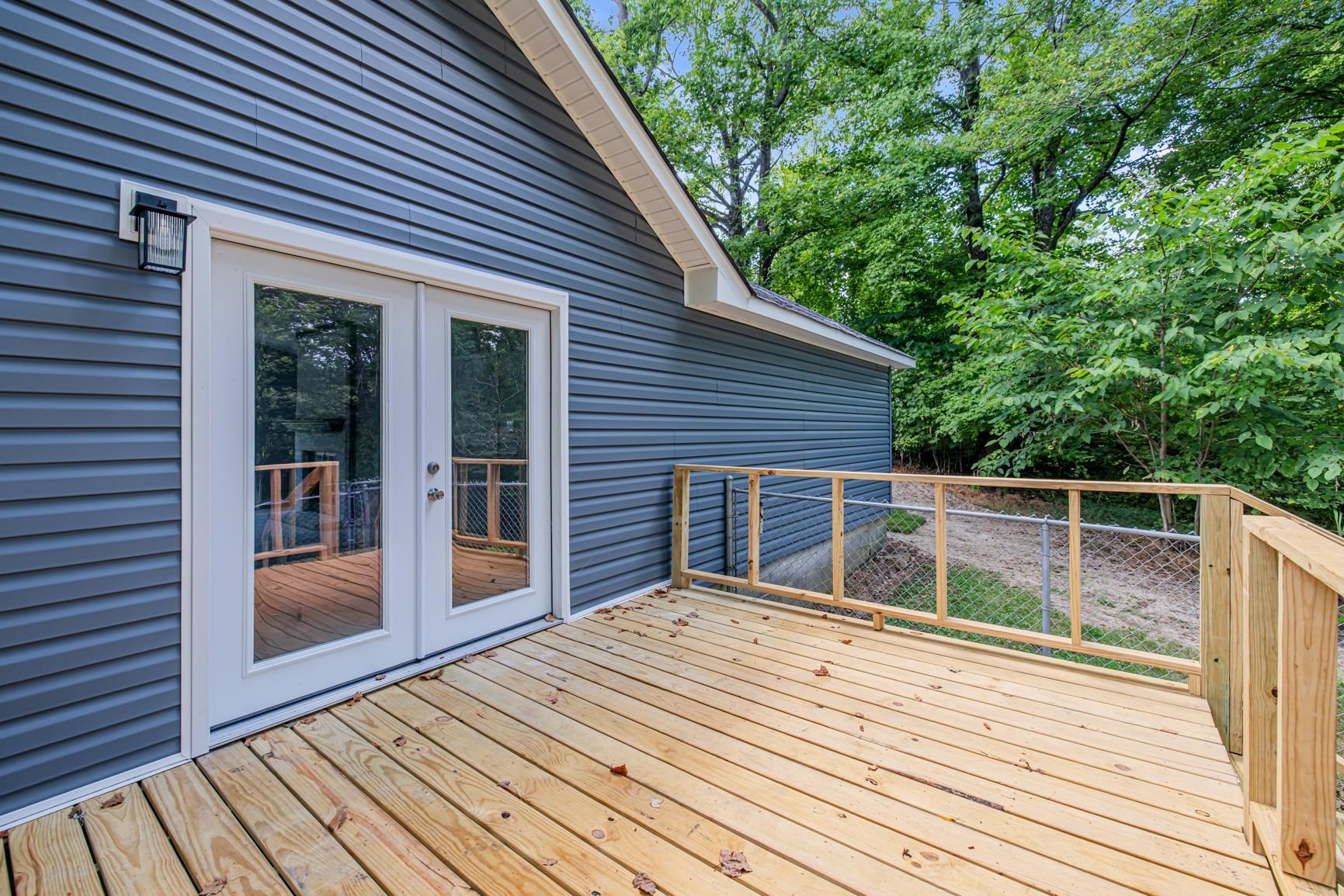 260 Chisolm Trail Road Atoka, TN 38004 - Photo 25 of 30 a backyard of a house with wooden floor
