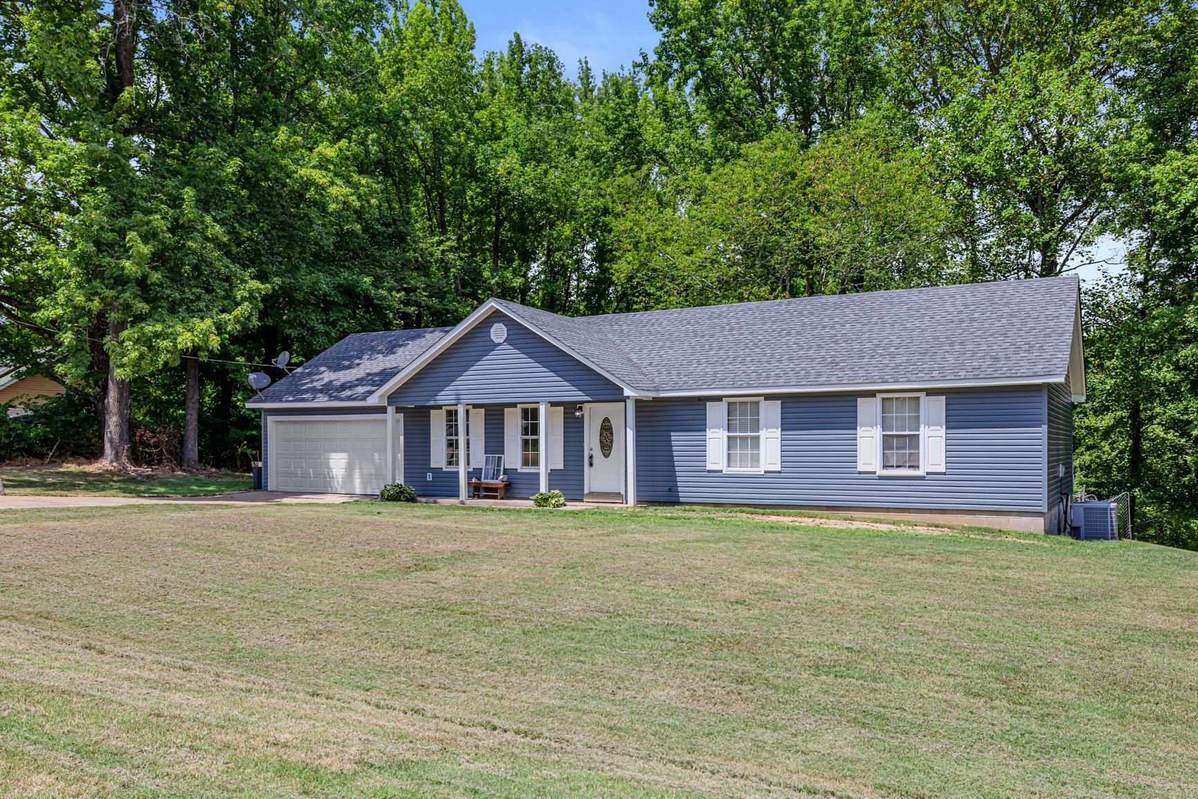 260 Chisolm Trail Road Atoka, TN 38004 - Photo 4 of 30 a view of a house with a yard