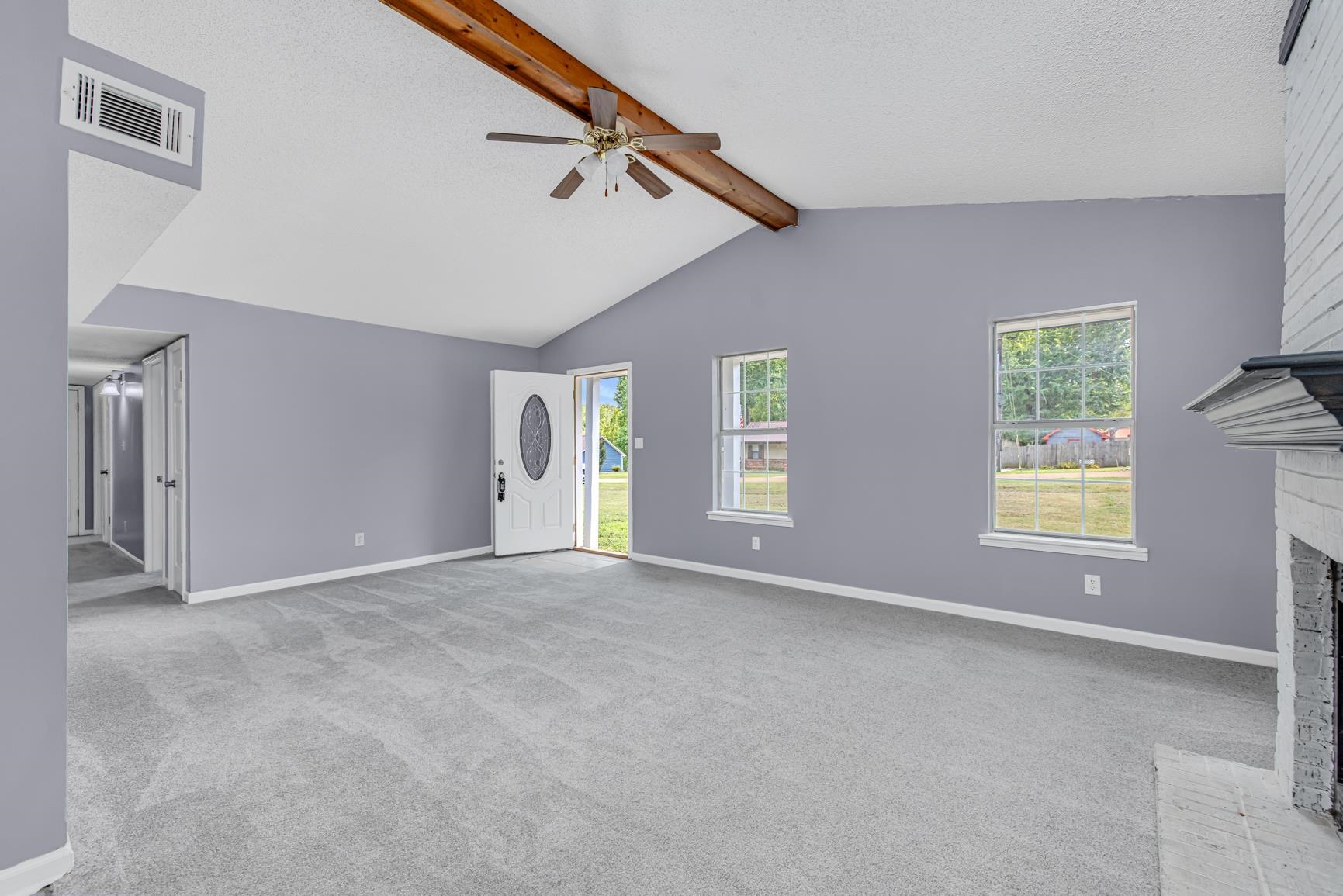 260 Chisolm Trail Road Atoka, TN 38004 - Photo 5 of 30 an empty room with windows