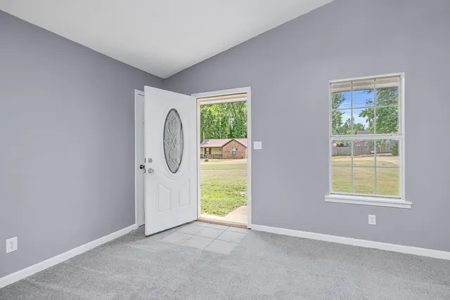 an empty room with windows