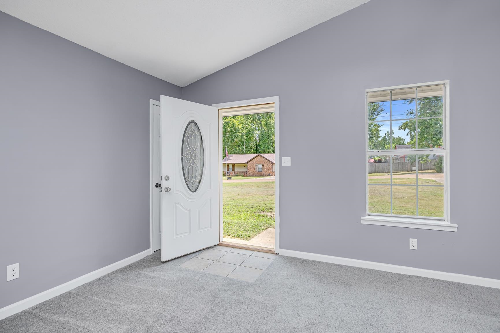 260 Chisolm Trail Road Atoka, TN 38004 - Photo 6 of 30 an empty room with windows