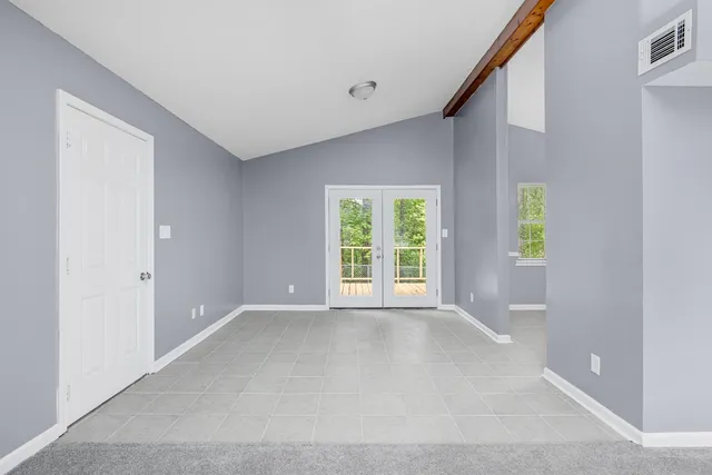 a view of an empty room with window