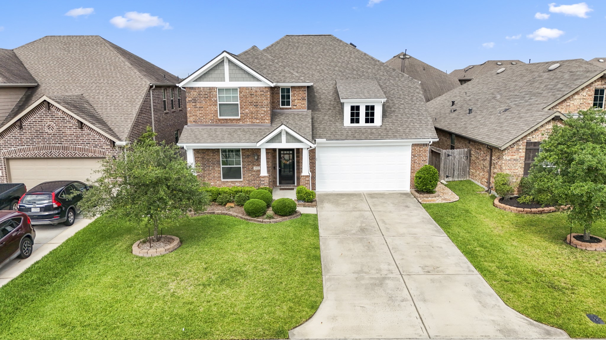 29522 Whitebrush Trace Drive Spring, TX 77386 - Photo 45 of 49 a front view of a house with garden