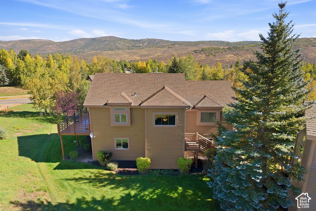 7396 Brook Hollow Loop Road Park City, UT 84098 - Photo 40 of 60 Exterior featuring wood siding, a multi-level deck, and a pitched roof