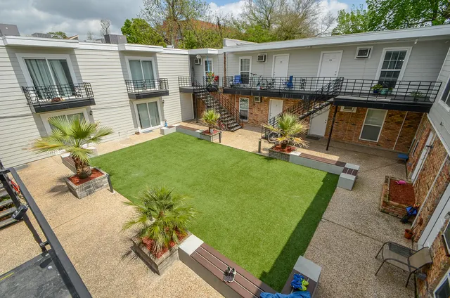 a view of a swimming pool with a patio