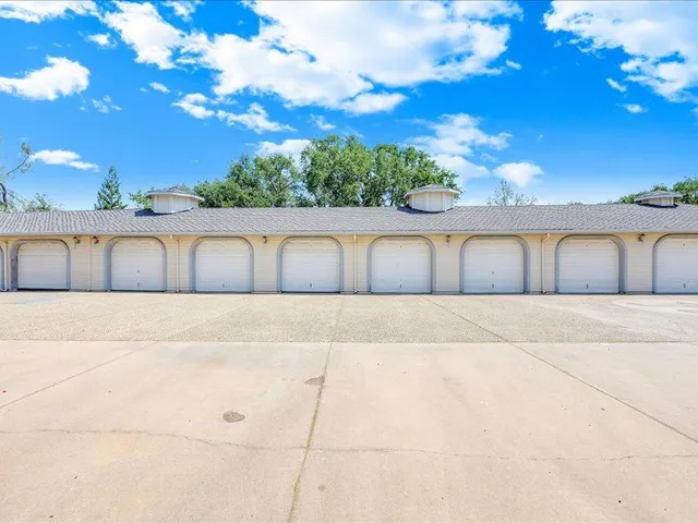 a view of swimming pool with a yard