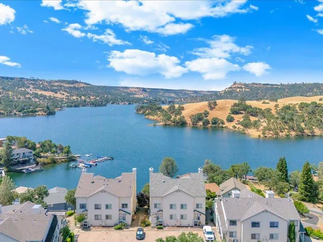 an aerial view of a houses with outdoor space