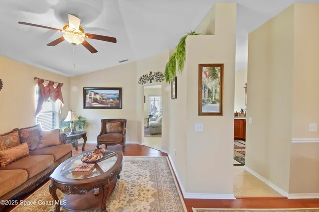 a living room with furniture and a rug
