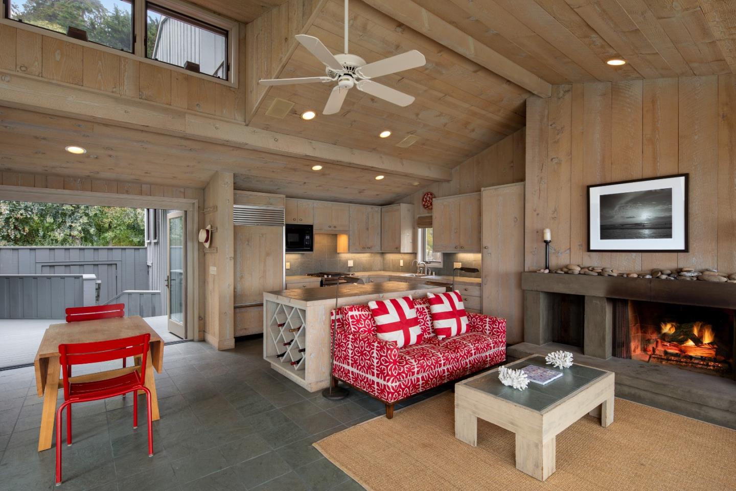 14 Potbelly Beach Road Aptos, CA 95003 - Photo 2 of 14 a living room with furniture and a flat screen tv