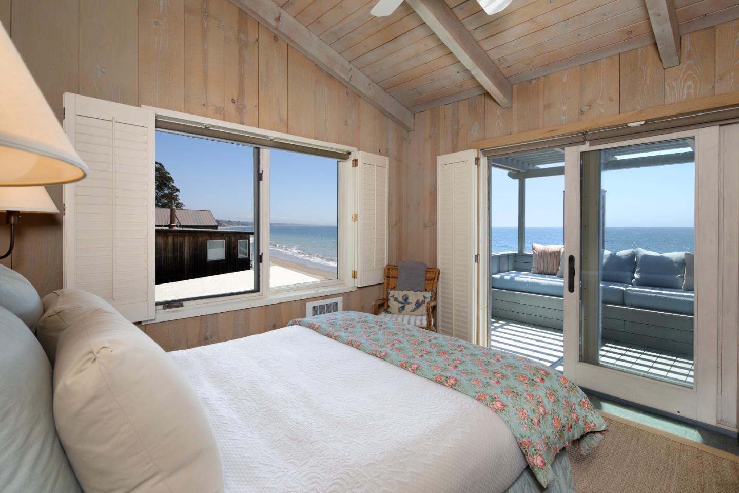 14 Potbelly Beach Road Aptos, CA 95003 - Photo 6 of 14 a bedroom with a bed and glass walk in closet