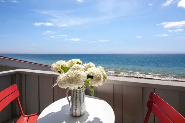 a vase of flowers sitting on a table