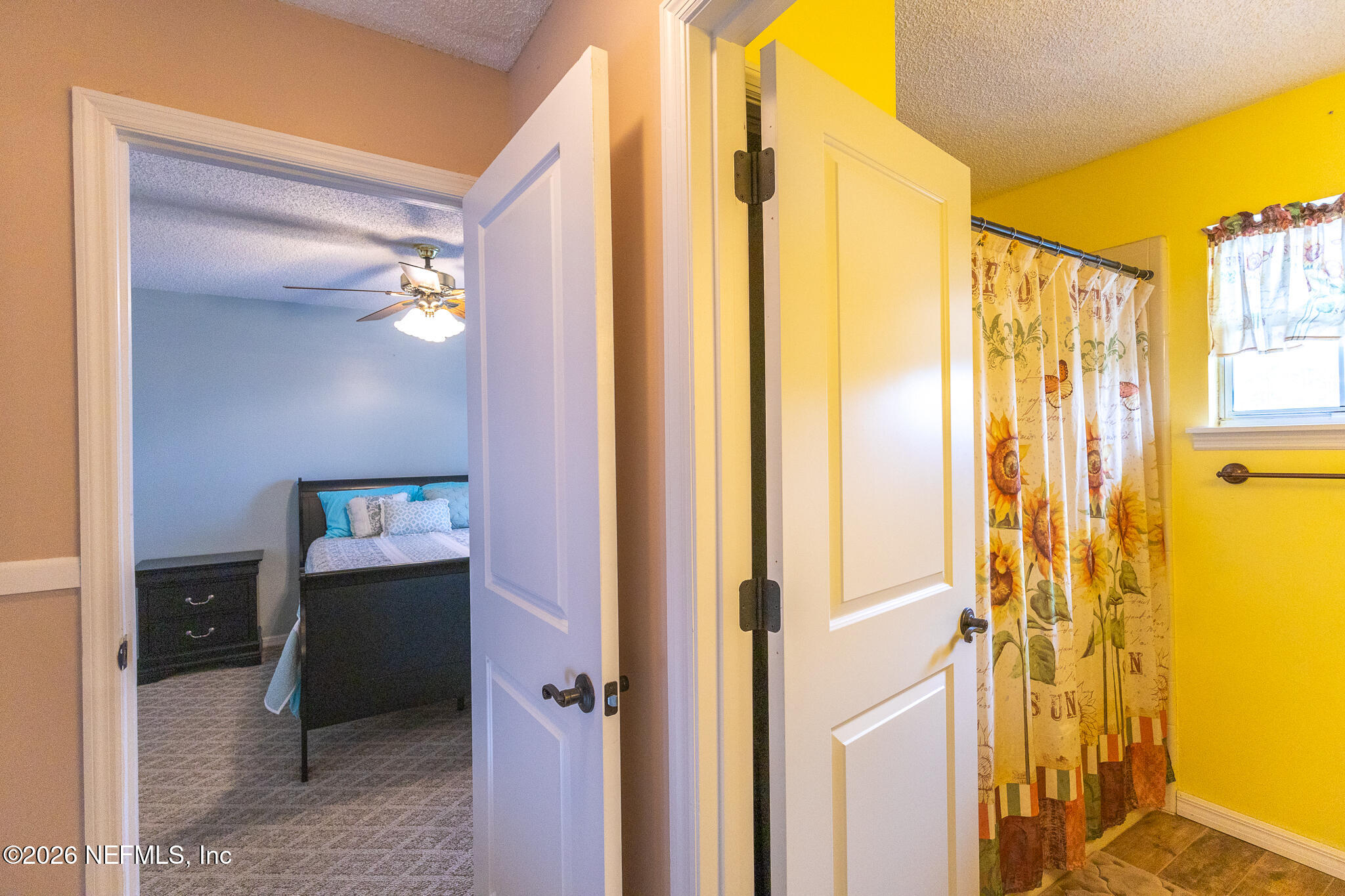 6110 4th Manor West Palatka, FL 32177 - Photo 23 of 44 a view of a bathroom with a shower and a sink