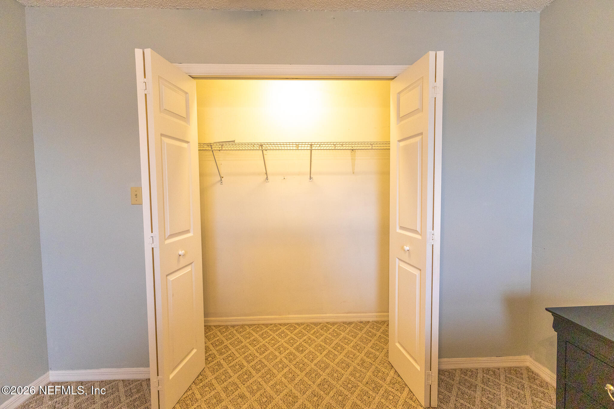 6110 4th Manor West Palatka, FL 32177 - Photo 25 of 44 a view of walk in closet with window