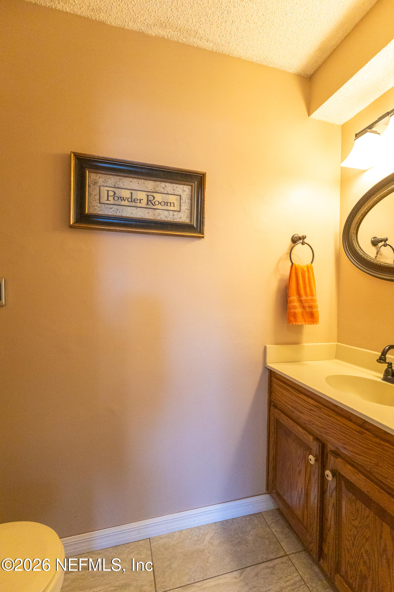 6110 4th Manor West Palatka, FL 32177 - Photo 32 of 44 a view of a bathroom with sink and mirror