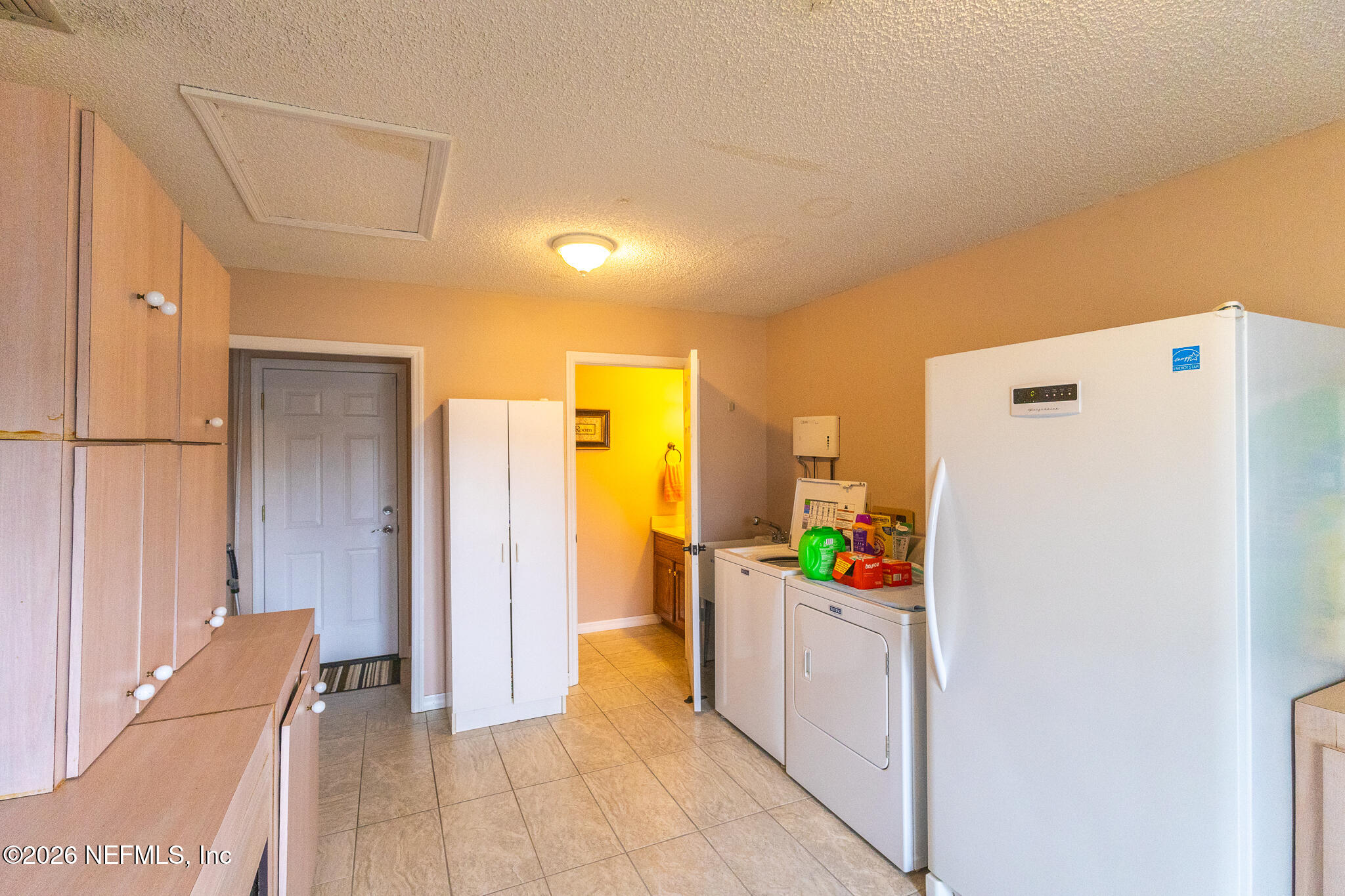 6110 4th Manor West Palatka, FL 32177 - Photo 33 of 44 a utility room with dryer and washer