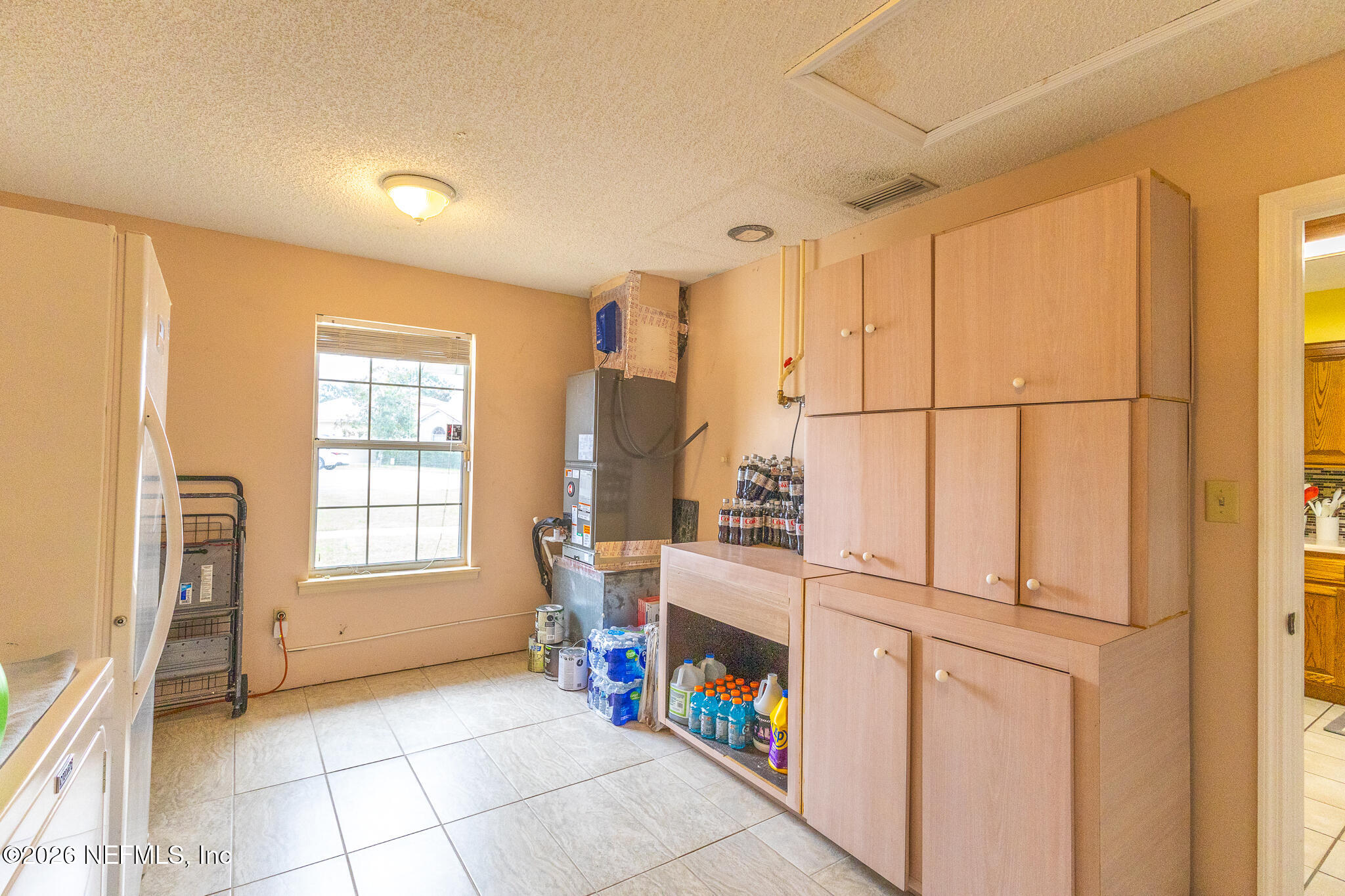 6110 4th Manor West Palatka, FL 32177 - Photo 34 of 44 a view of a kitchen with furniture and a window