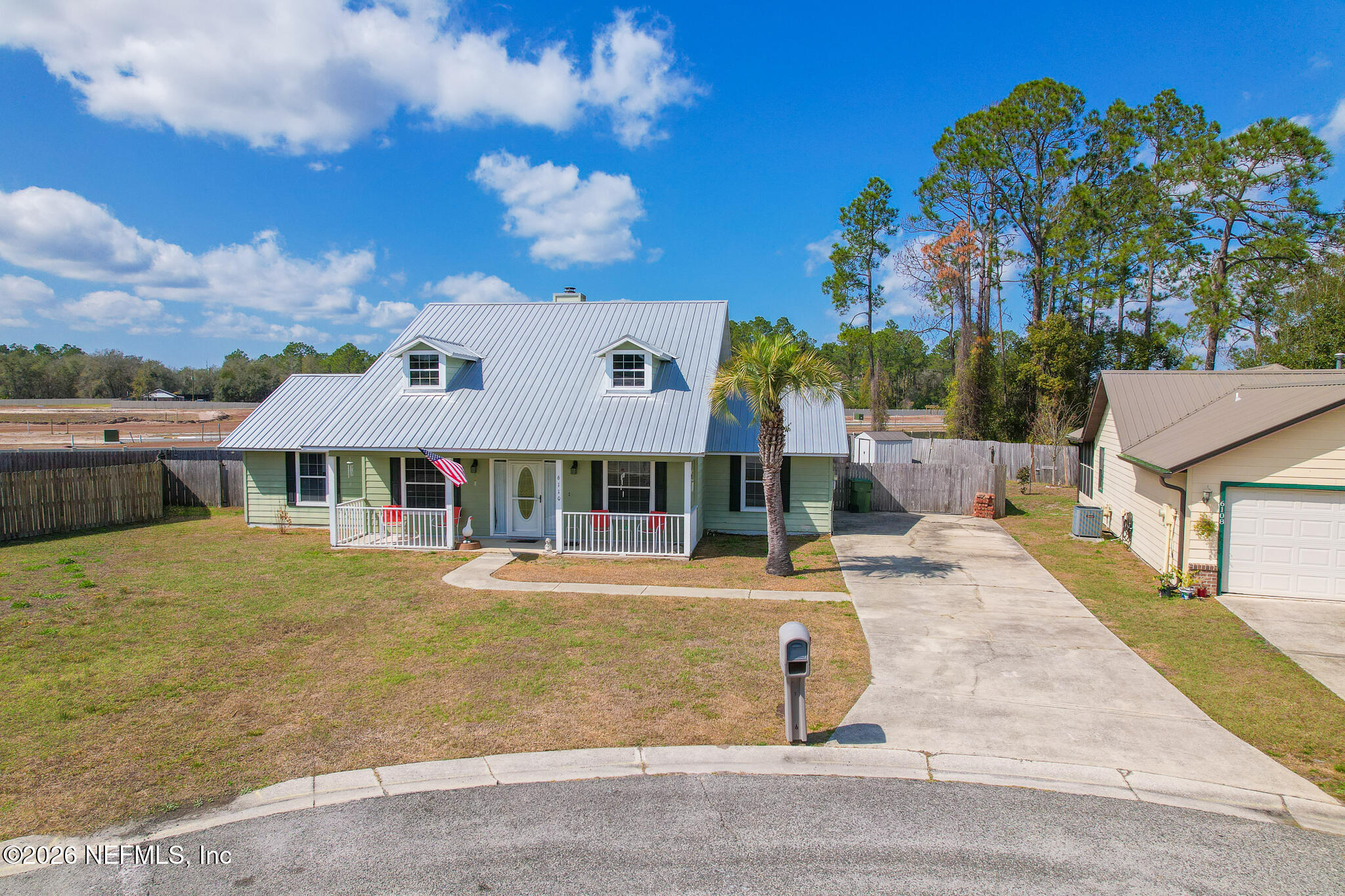 6110 4th Manor West Palatka, FL 32177 - Photo 4 of 44 front view of a house with a yard