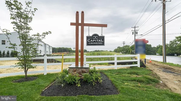 a view of a park with welcome board