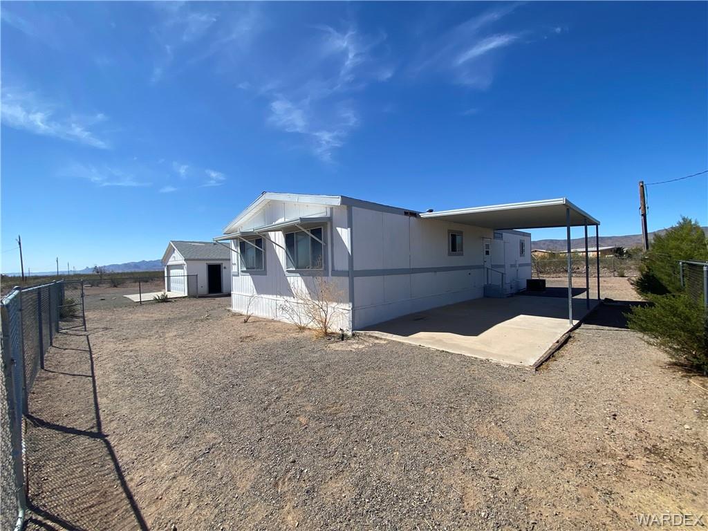4649 Eden Road Golden Valley, AZ 86413 - Photo 3 of 26 a view of a house with a snow