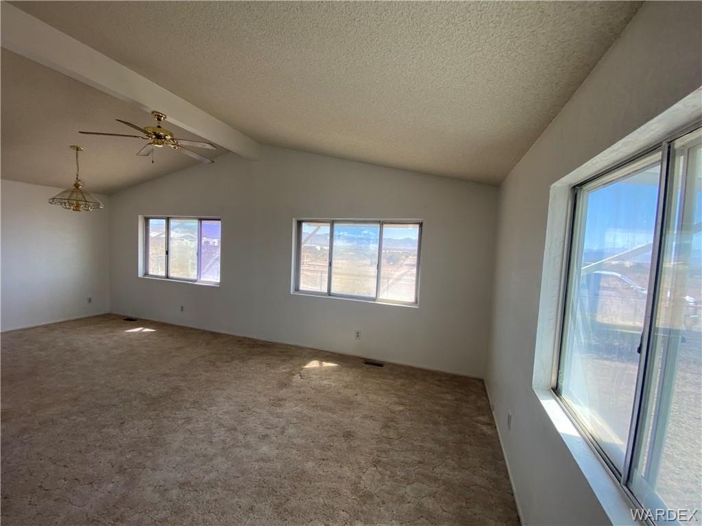 4649 Eden Road Golden Valley, AZ 86413 - Photo 4 of 26 a view of empty room with windows