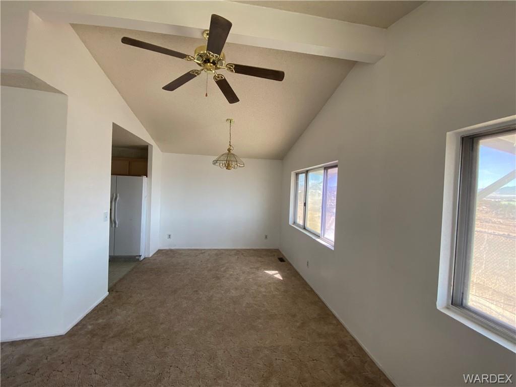 4649 Eden Road Golden Valley, AZ 86413 - Photo 6 of 26 a view of an empty room with a window