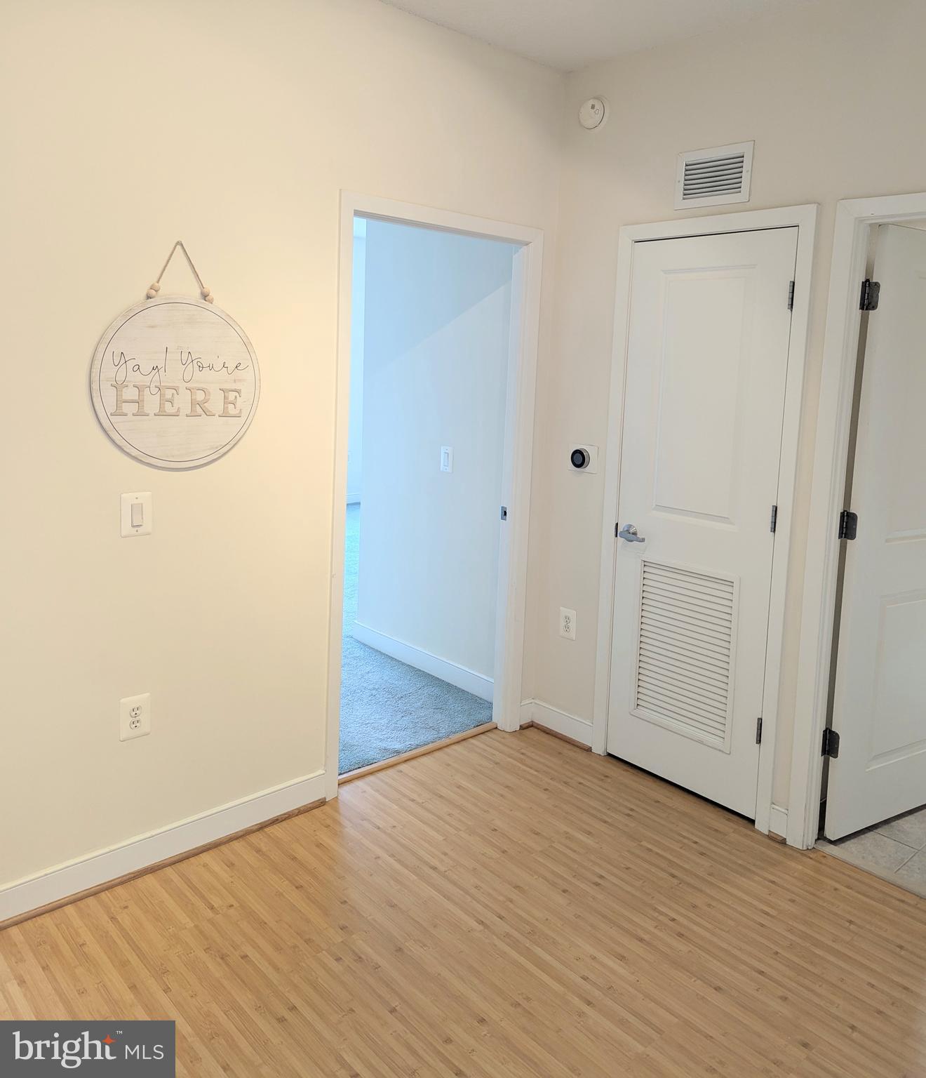 820 North Pollard Street, Unit 810 Arlington, VA 22203 - Photo 16 of 49 a view of a room with wooden floor