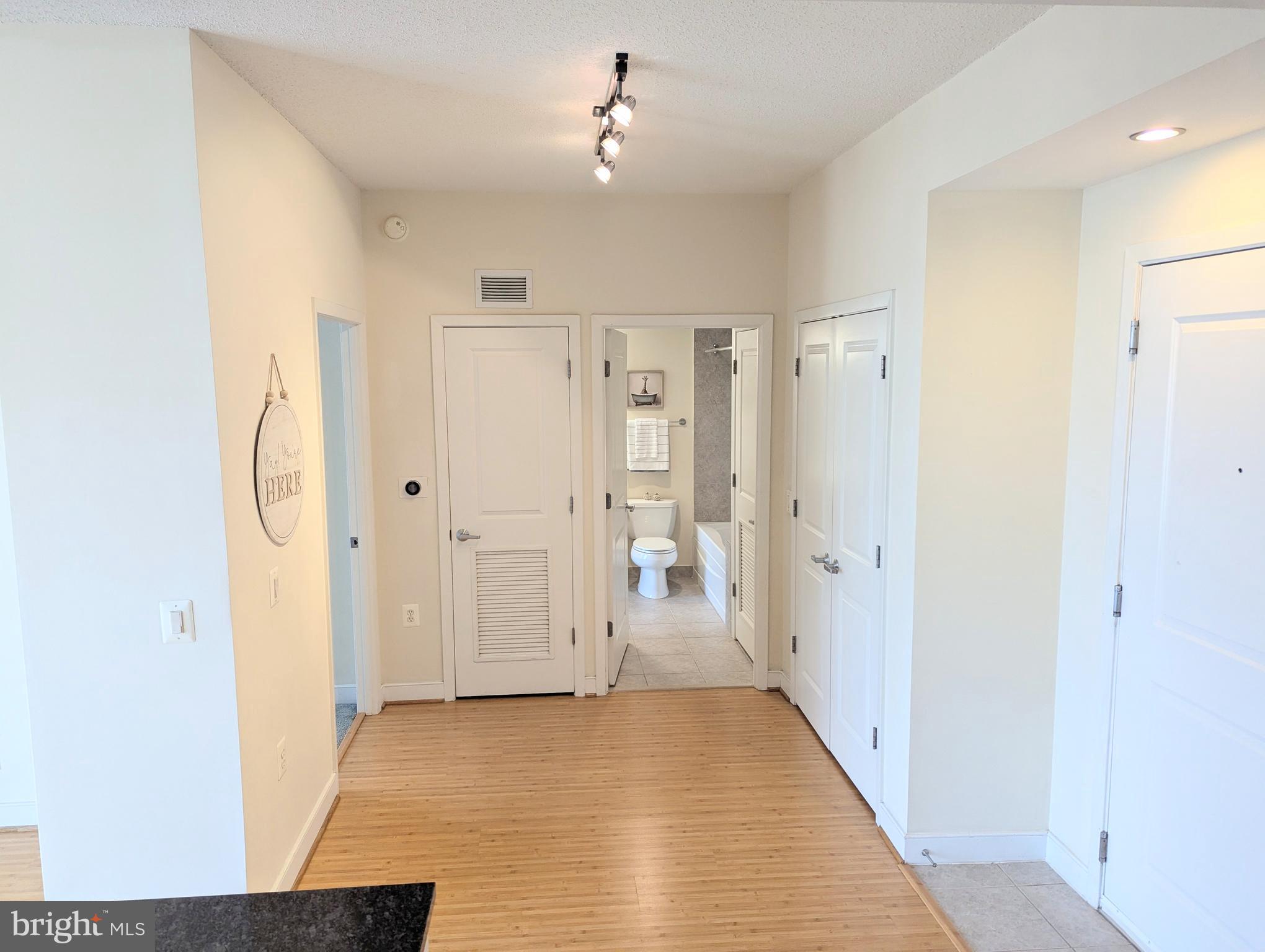 820 North Pollard Street, Unit 810 Arlington, VA 22203 - Photo 18 of 49 a view of a bathroom with a shower and a sink