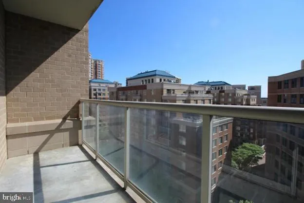 a bathroom with a sink mirror and a bathtub