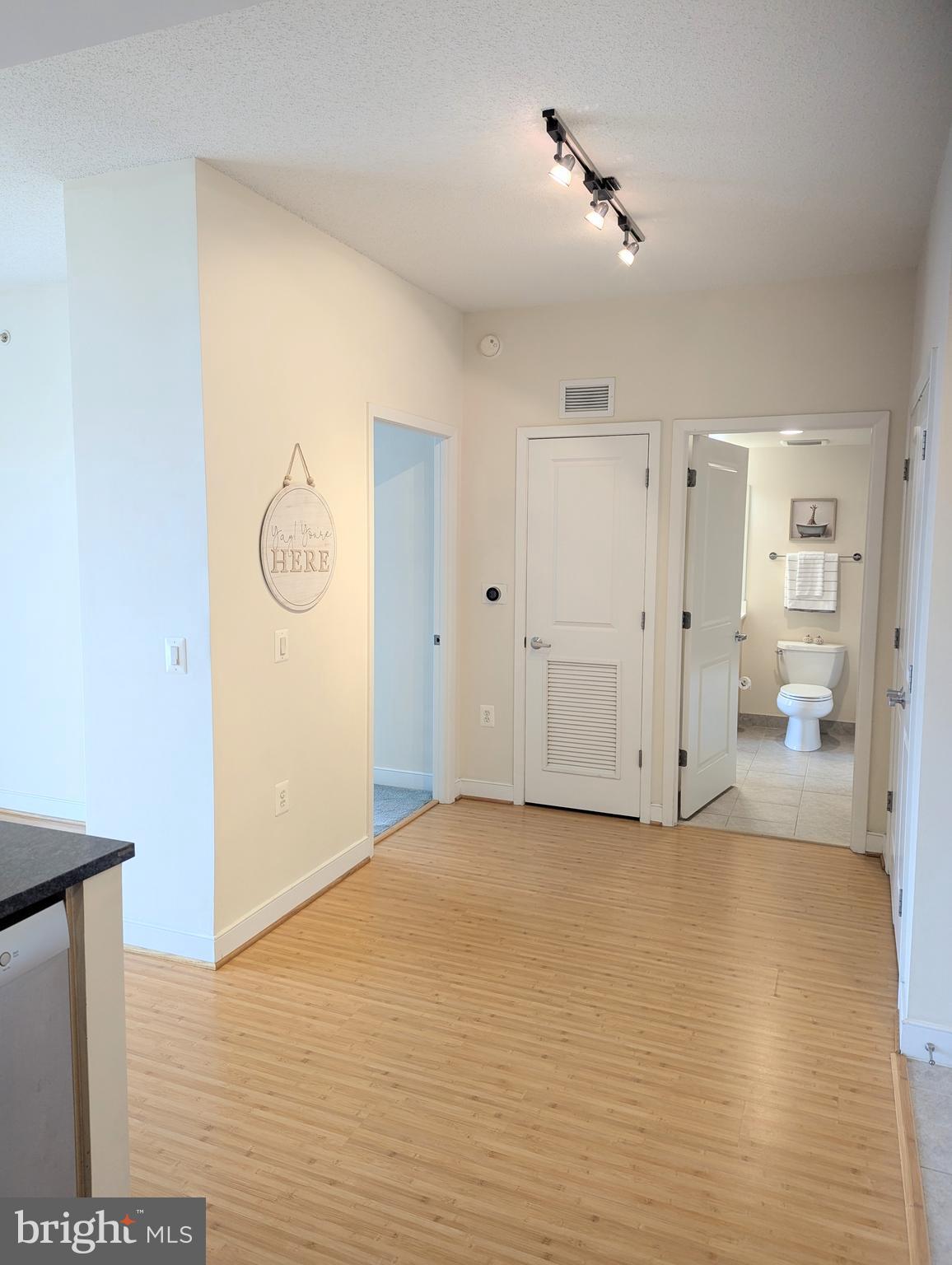 820 North Pollard Street, Unit 810 Arlington, VA 22203 - Photo 27 of 49 a view of a livingroom with wooden floor