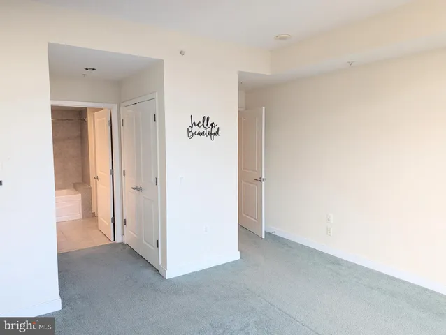 a view of a room with a hallway