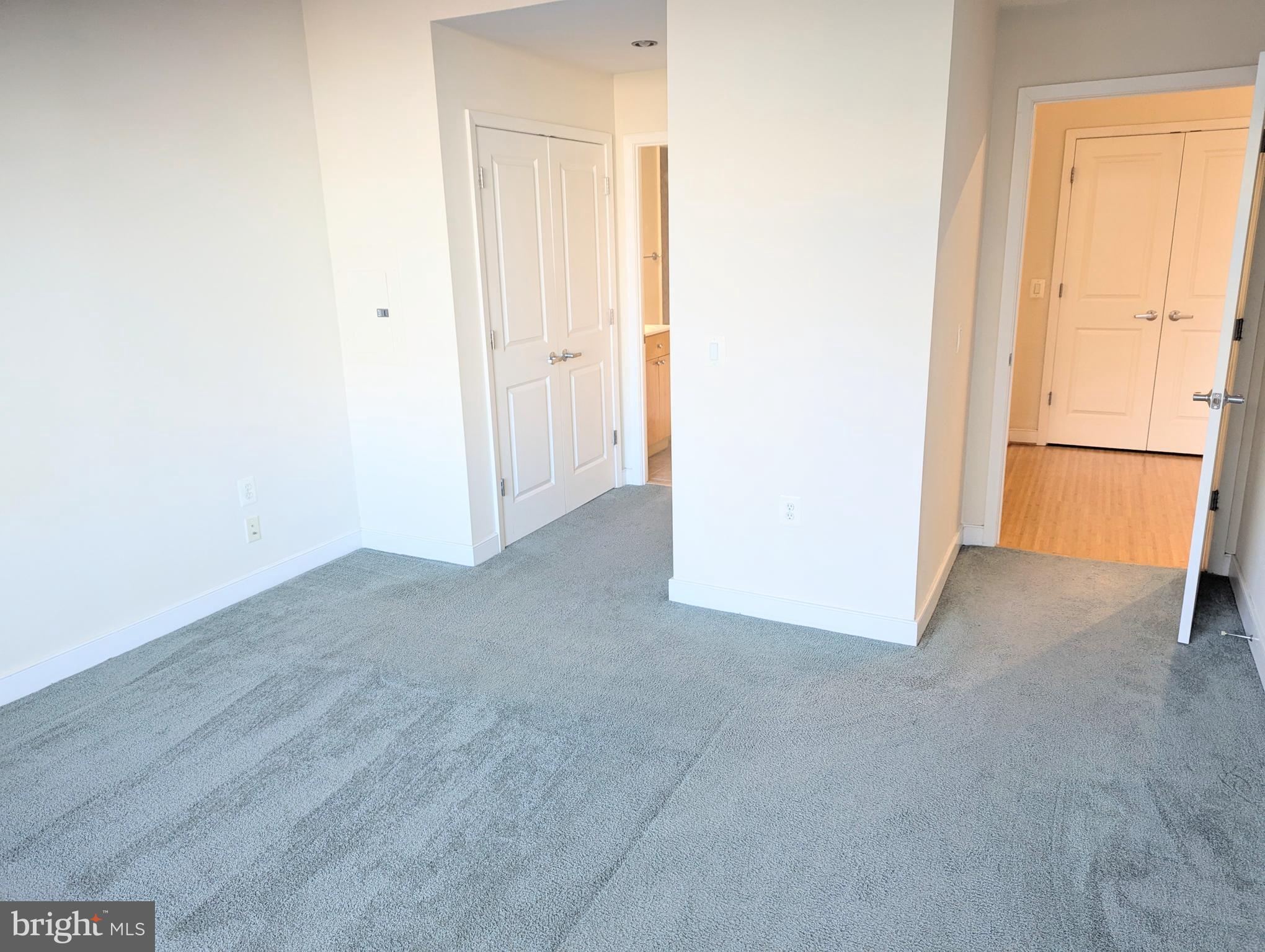 820 North Pollard Street, Unit 810 Arlington, VA 22203 - Photo 33 of 49 a view of a room with a hallway