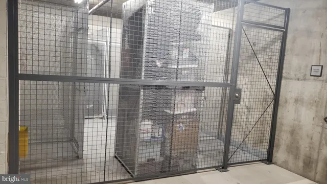 a view of a chairs and table in the backyard of the house