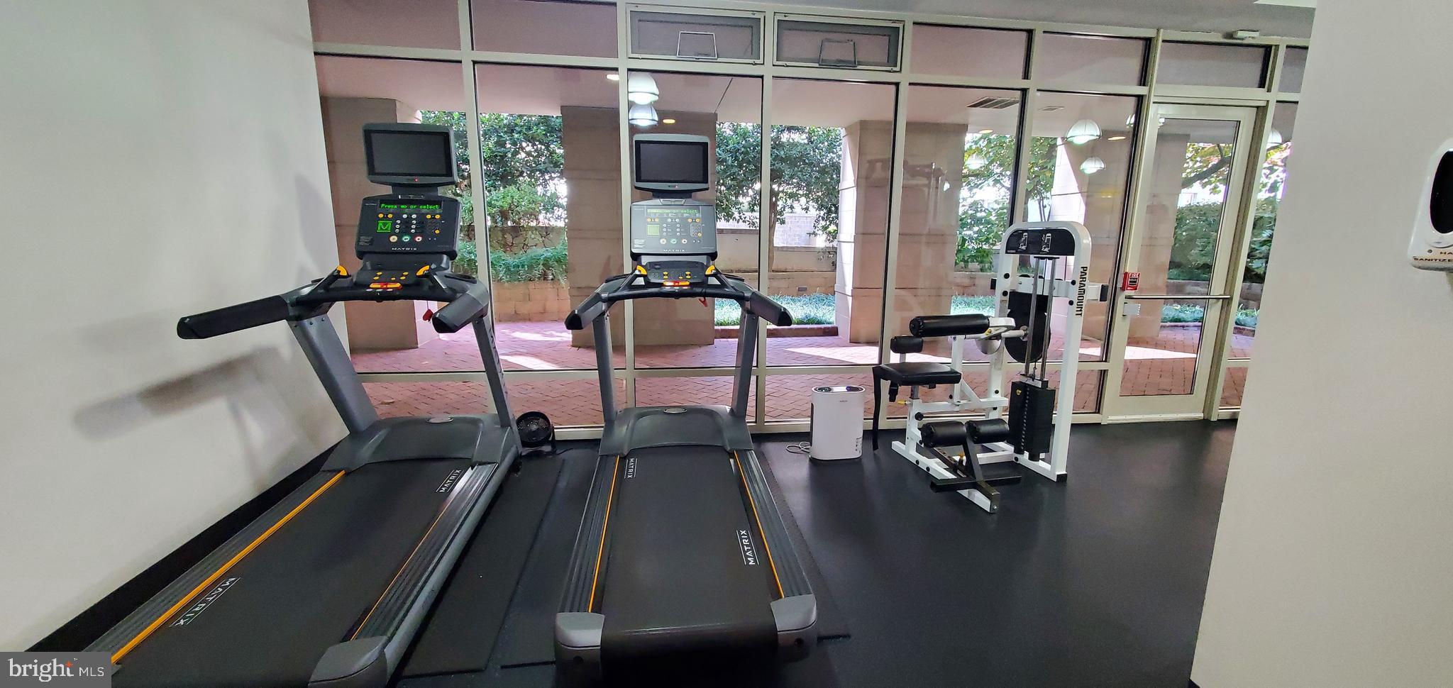 820 North Pollard Street, Unit 810 Arlington, VA 22203 - Photo 46 of 49 a view of a living room with furniture and floor to ceiling window