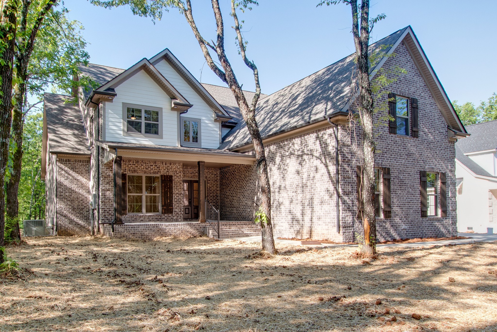 935 Allen Road Murfreesboro, TN 37129 - Photo 3 of 31 a front view of a house with a tree
