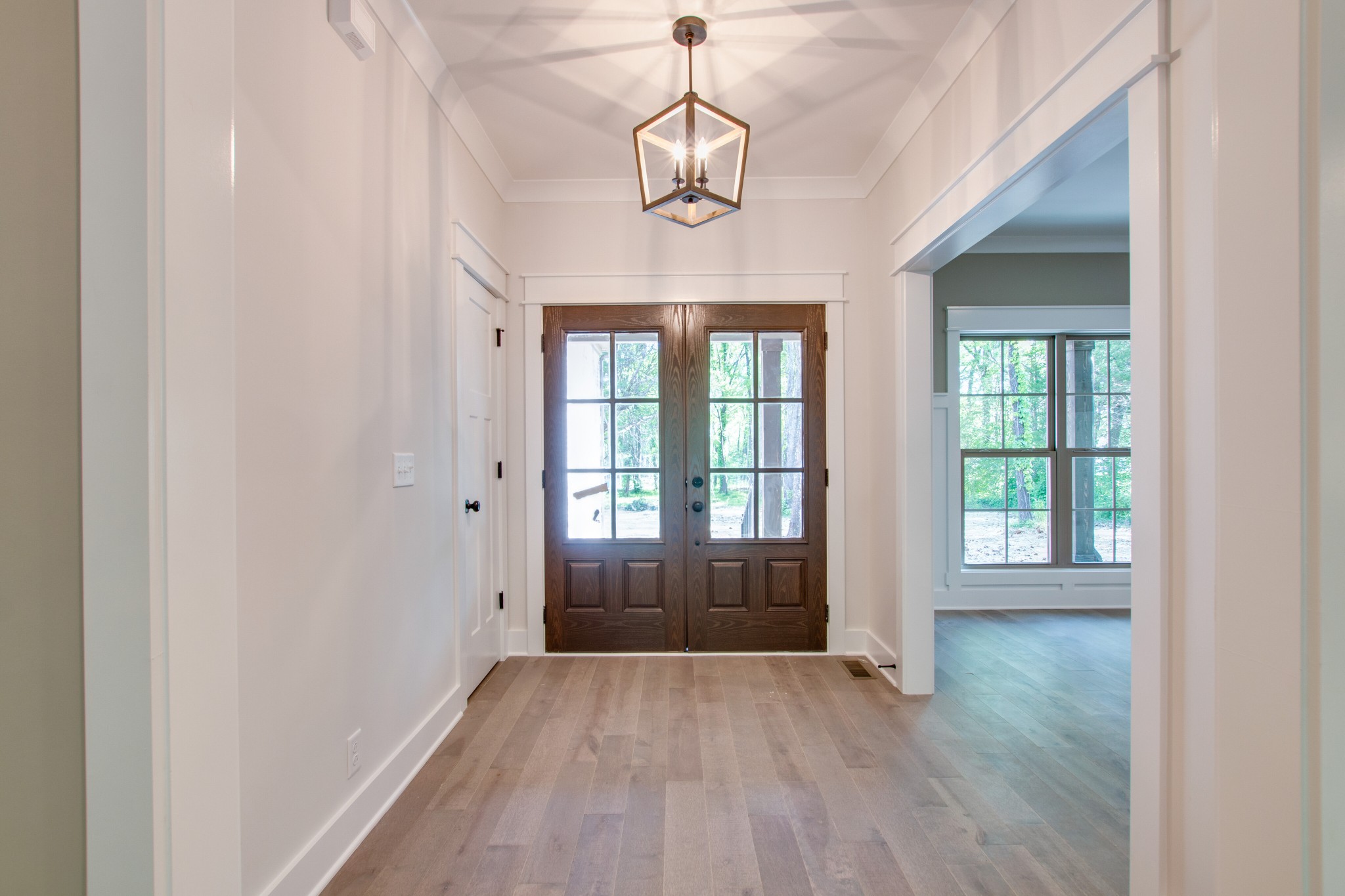 935 Allen Road Murfreesboro, TN 37129 - Photo 5 of 31 an empty room with wooden floor and windows