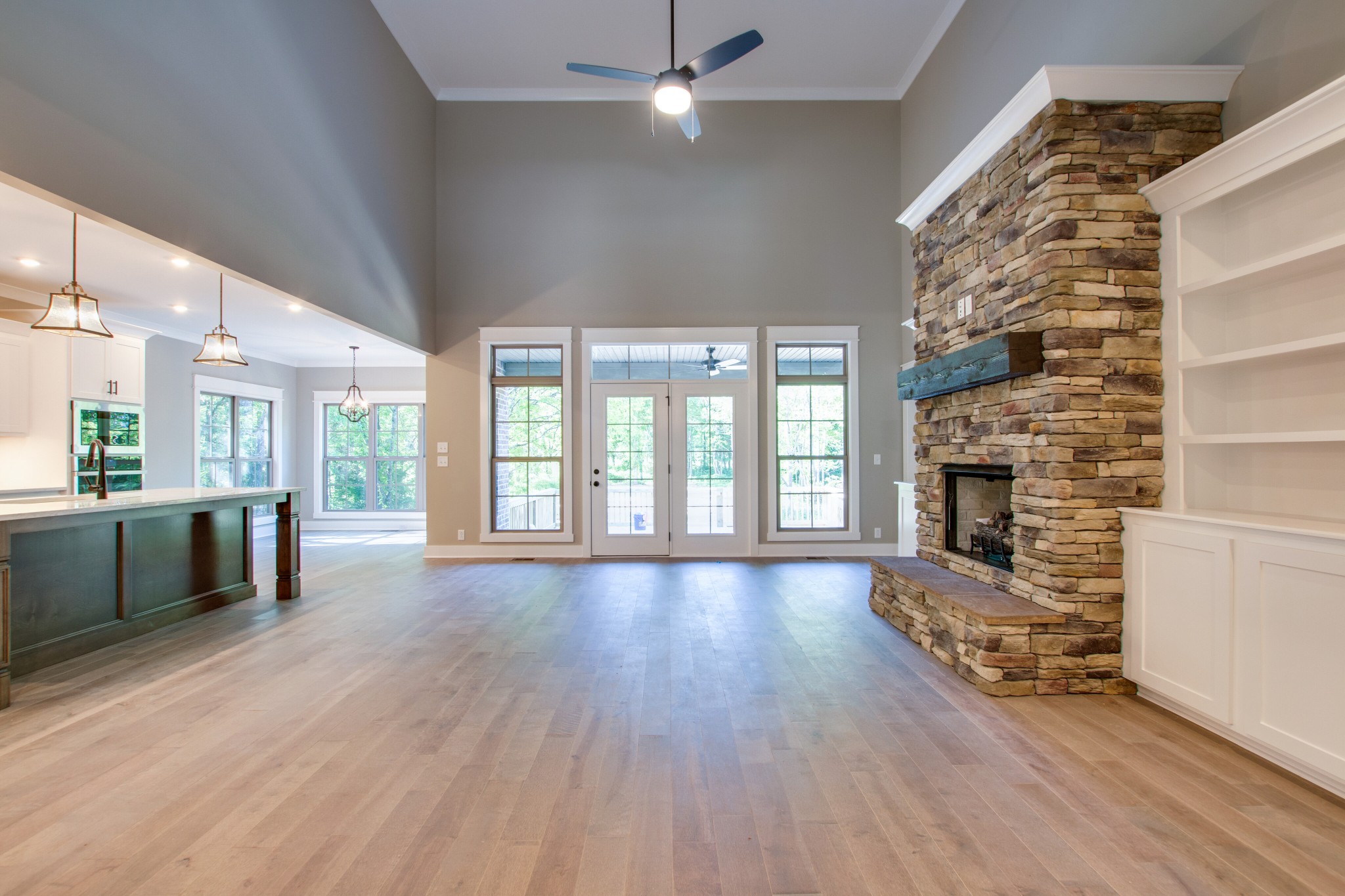 935 Allen Road Murfreesboro, TN 37129 - Photo 7 of 31 wooden floor in an empty room with a fireplace