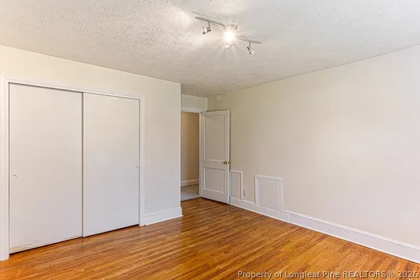 a bathroom with a shower curtain and curtain