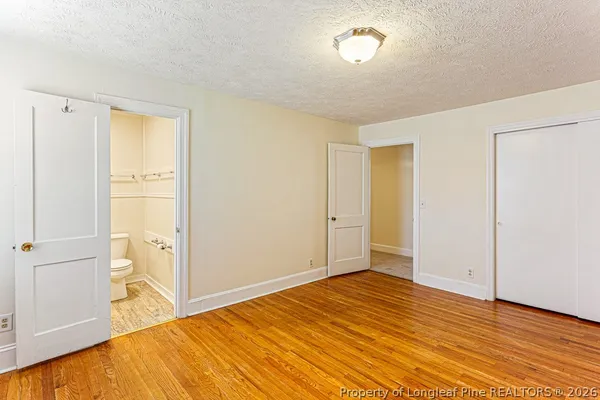 a bathroom with a sink toilet and vanity