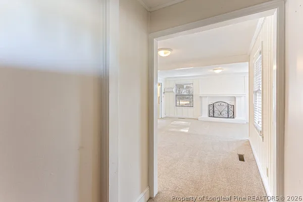a view of a hallway with closet