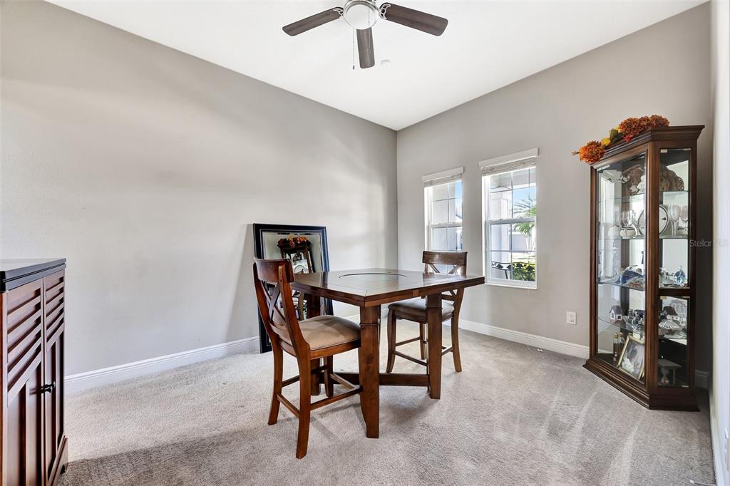 6324 Brevada Lane Apollo Beach, FL 33572 - Photo 31 of 45 a dining room with furniture and window