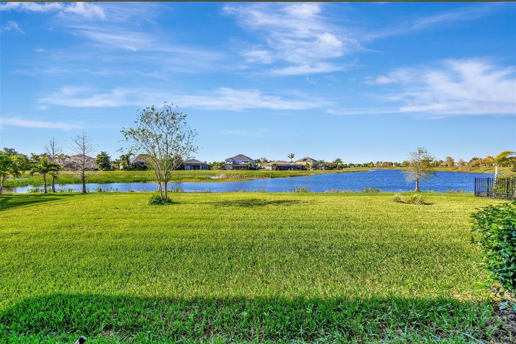 6324 Brevada Lane Apollo Beach, FL 33572 - Photo 41 of 45 a view of a lake with houses in the back