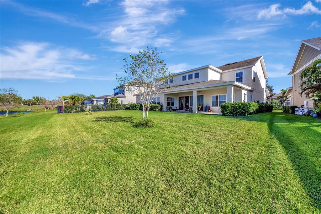 6324 Brevada Lane Apollo Beach, FL 33572 - Photo 42 of 45 a front view of a house with garden