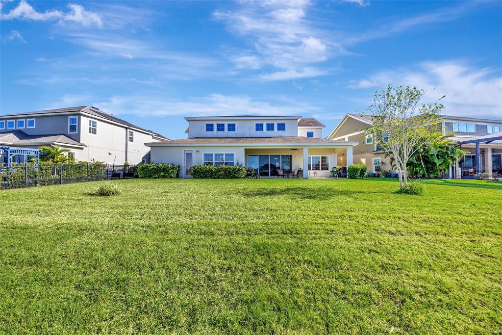 6324 Brevada Lane Apollo Beach, FL 33572 - Photo 43 of 45 a view of a house with a big yard