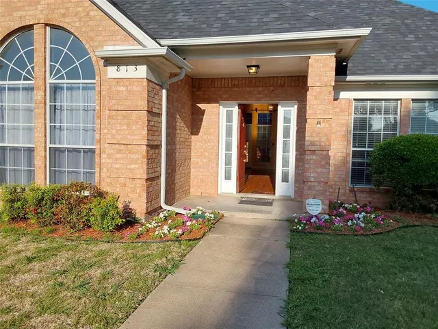 a front view of a house with an outdoor space